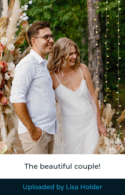 Example of uploaded photo of couple Example of a photo uploaded to the Hitched live streaming platform. The image is of the bride and groom smiling off-camera.